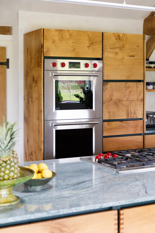 Wolf ovens in custom made oak kitchen